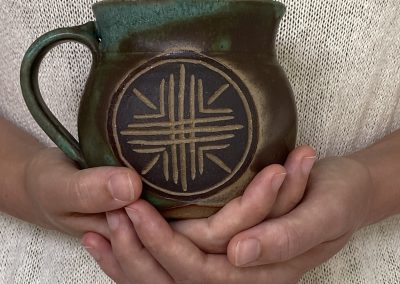 Carved shield mug