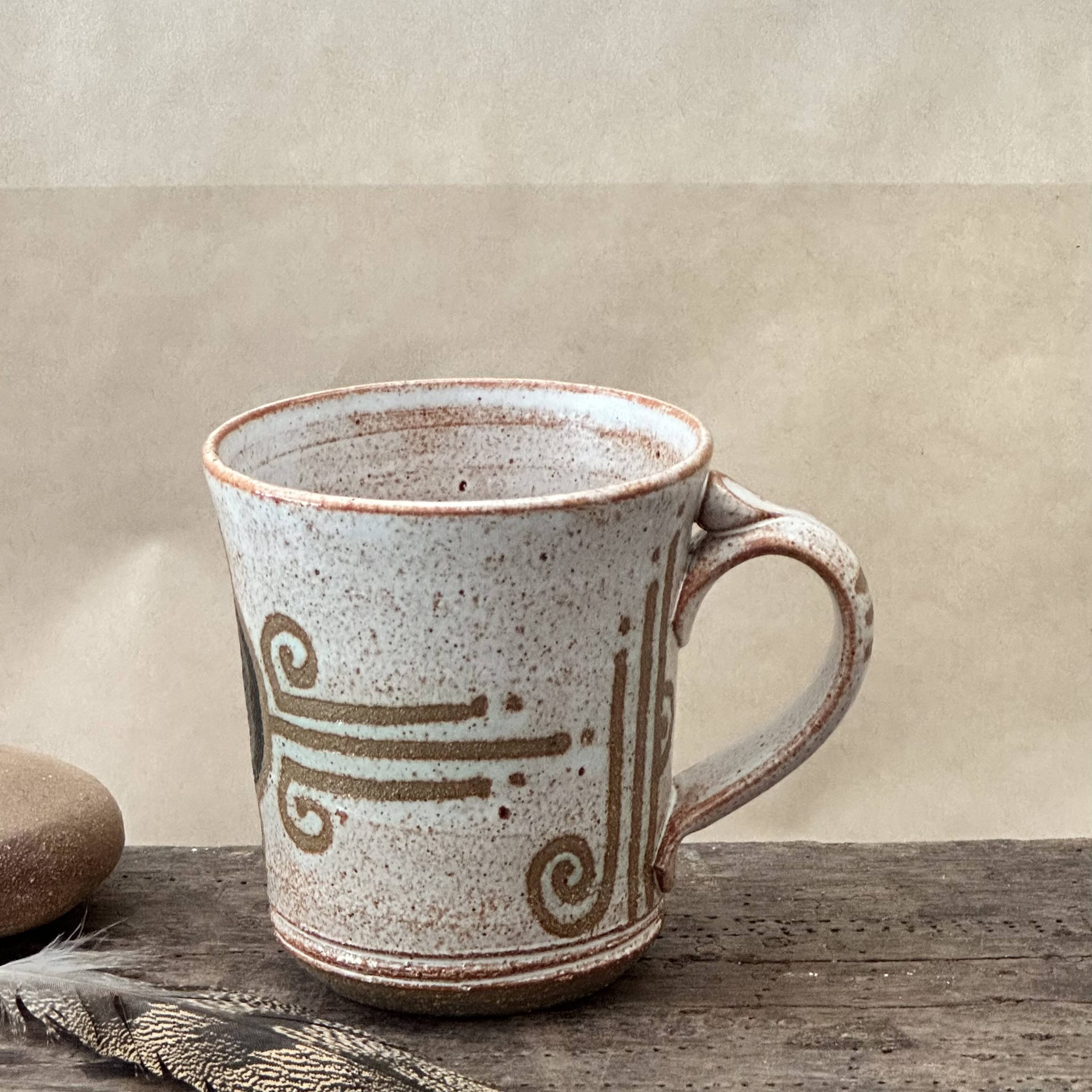 ZENITH MUG | SANDSTONE GLAZE | TRIBAL DESIGN WITH MATTE BLACK SHEILD